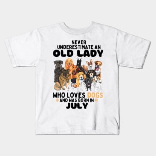 Never Underestimate An Old Lady Who Loves Dogs And Was Born In July Kids T-Shirt